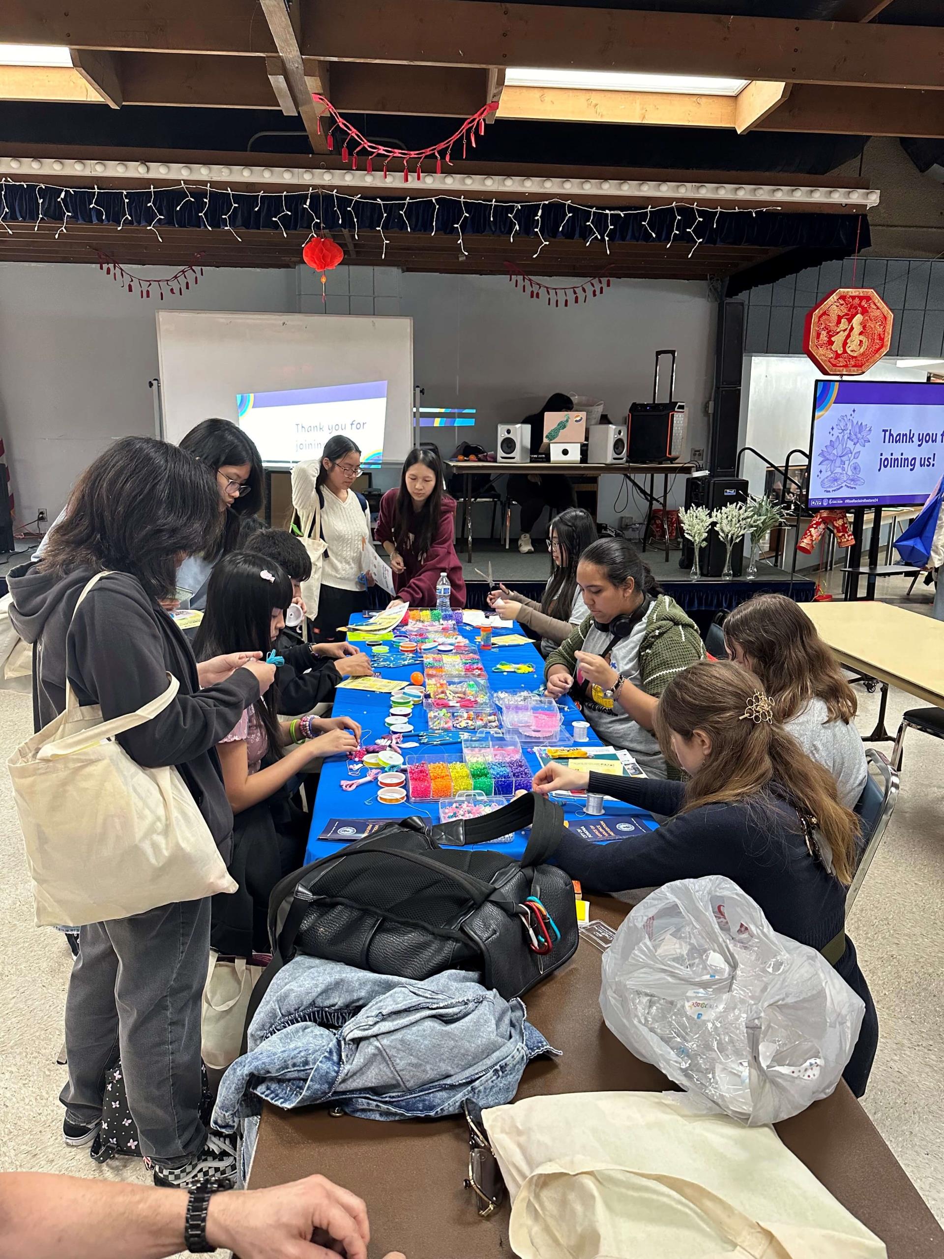 OVP hosting a friendship bracelet making activity